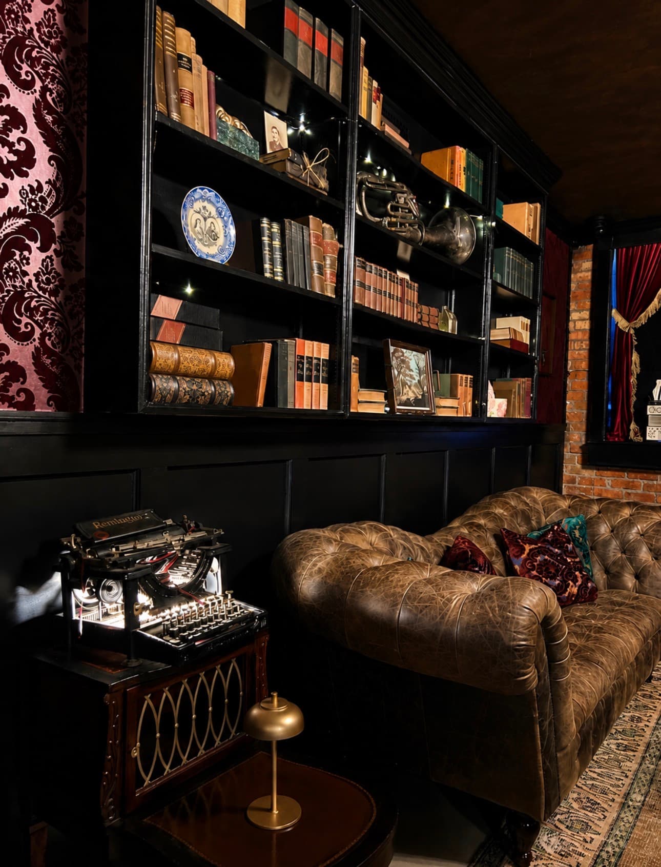 The Archive Lounge — warm lighting and vintage materials