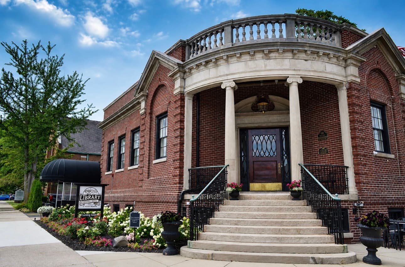 The Library Historic Hotel — a restored 1904 Carnegie library reimagined as a 21+ boutique hotel in downtown St. Joseph, Michigan